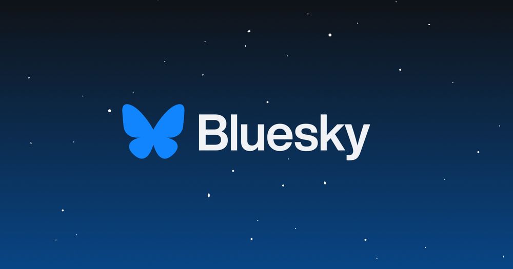 Photo of Bluesky's banner, featuring their logo which is white text which says "Bluesky" on it, to the left of the text is a Blue Butterfly icon. The background is dark blue and black nearer the top, with stars in the sky.