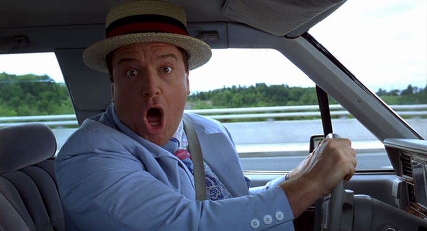 Tom Arnold as Stanley Stupid in The Stupids, realizing that his life is in danger by the Drive Bee.