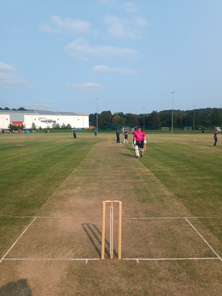 A cricket wicket, from the bowlers point of view. 