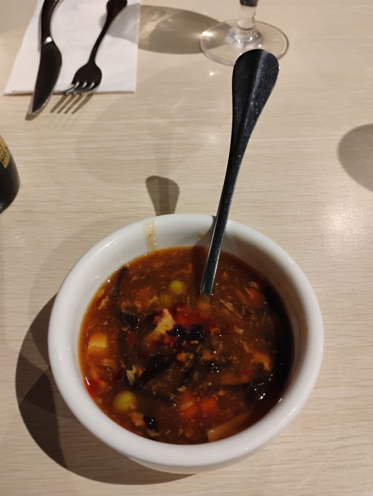 A small bowl of hot and sour soup 