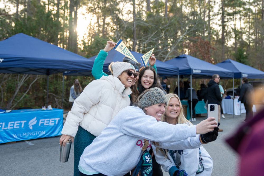 People taking a selfie in winter apparel 