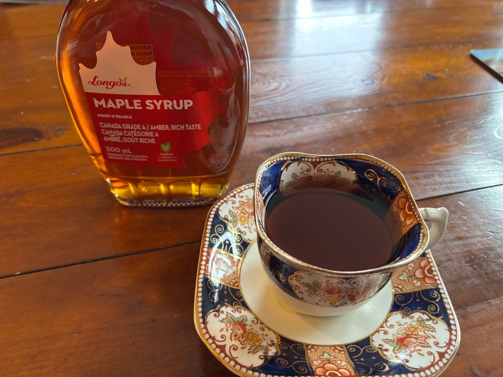 Of course the tea (still in the “Russian tea cup”) had to take a picture with a bottle of maple syrup. Maybe I’ll strengthen the flavour with a dollop of extra syrup. 