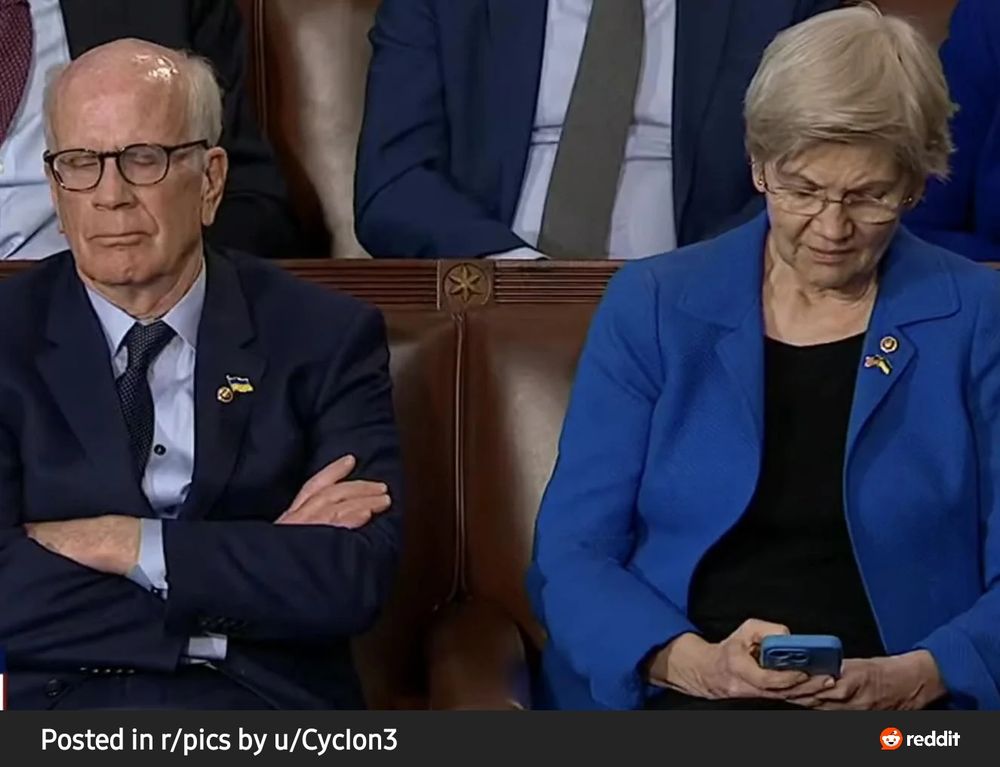Elizabeth Warren looking at her phone during the 2025 #SOTU