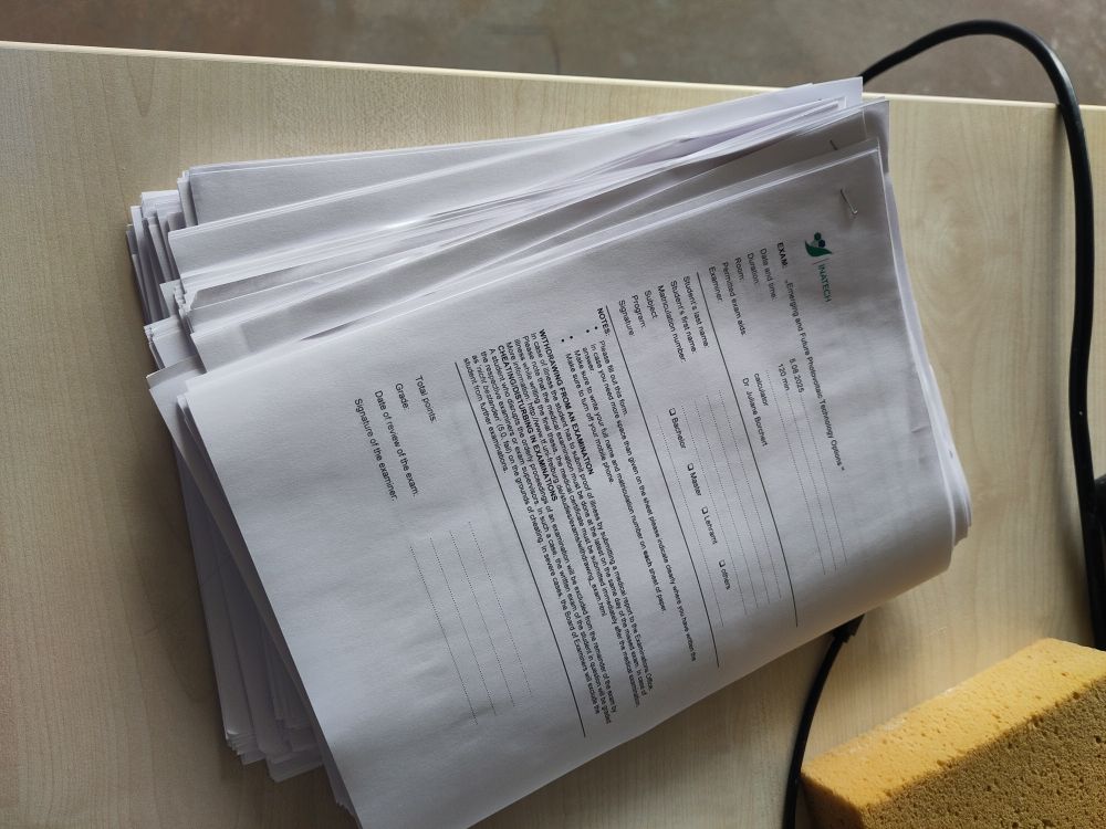 A thick stack of exam papers
