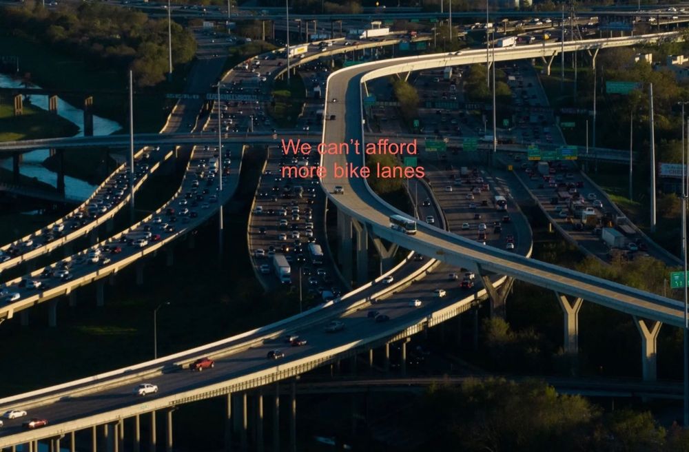 Image of an enormous highway interchange with the words "We can't afford more bike lanes" superimposed.