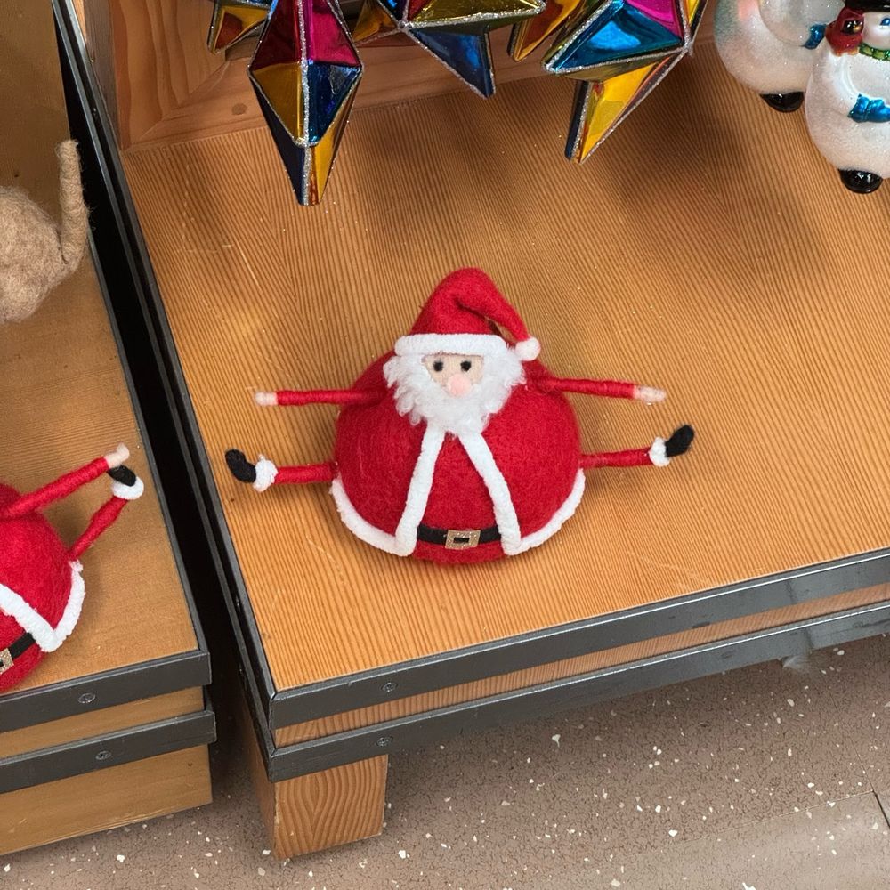 Santa in an acrobatic pose