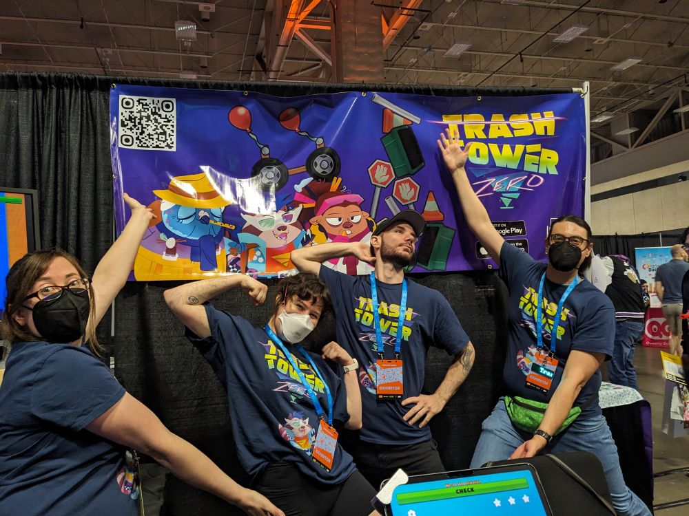 Event photographer, primary artist, composer, and programmer hamming it up in front of the Trash Tower booth