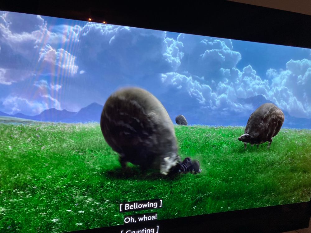 Anakin has just fallen off the cow-thing from Attack of the Clones. Subtitle text reads:
[Bellowing]
Oh, woah!
[Grunting]