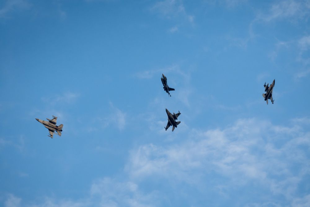 Four Republic of Singapore Air Force F-16s executing a manoeuvre during Singapore's National Day Parade Preview 2