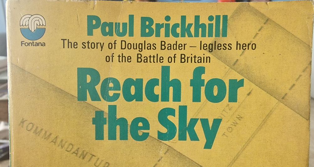 cover of 70s edition of P Brickhill "Reach for the Sky" v popular postwar biog of Douglas Bader, later a film starring the excruciating Kenneth More 