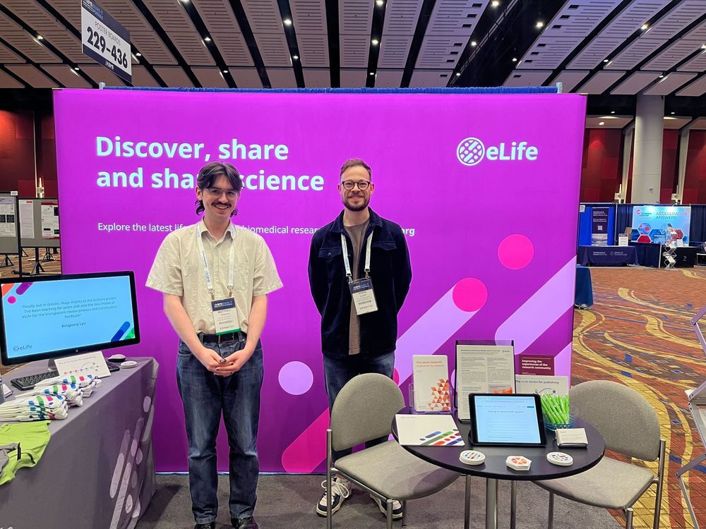 phot of shane and matthew at the E life booth at ASBMB