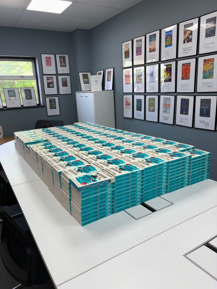 A big pile of paperbacks Robert has to sign