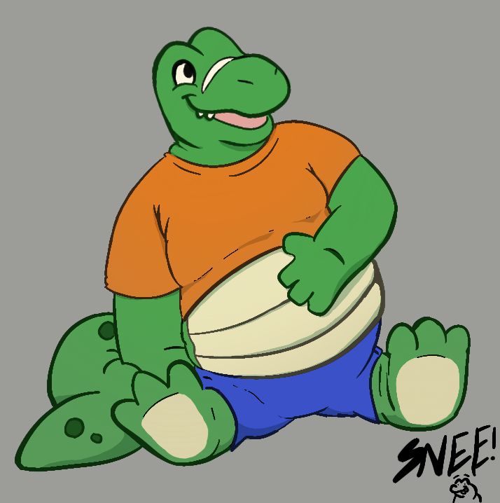 The ever wonderful Tobi sitting down wearing an orange shirt and blue pants 