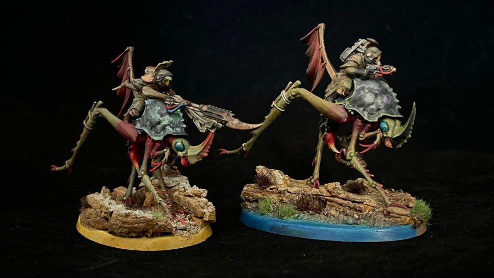 Two Necromunda Ash Nomads riding a Dustback Helamites on scenic bases. Miniature on the right was painted 1/2024