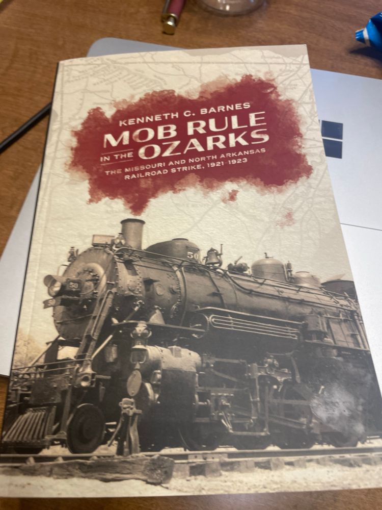Book cover for Kenneth Barnes’ Mob Rule in the Ozarks. A picture of an old steam train appears below the title.
