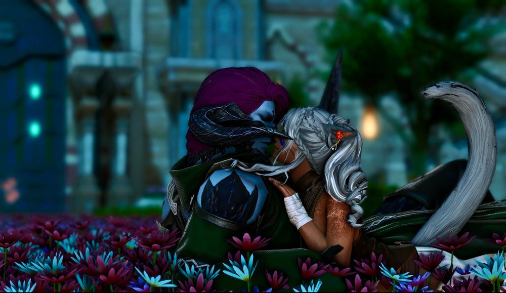 FFXIV GPose screenshot of the same characters lying in a similar position in the same garden, but older now. It’s nighttime. The au ra is now leaning up on his elbows with one hand cupping the miqo’te’s arm as she leans up for a kiss. 