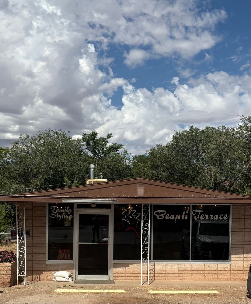 An old school 1 story tan brick bldg. 