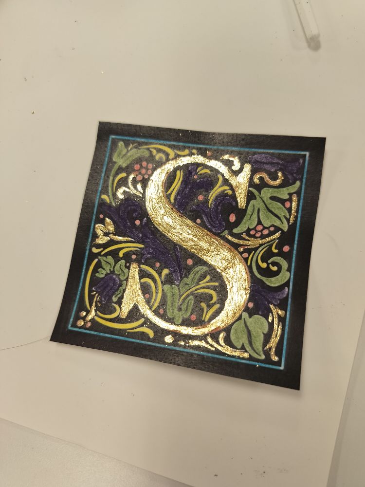 Photo of a beautiful illuminated initial S (made by a student)