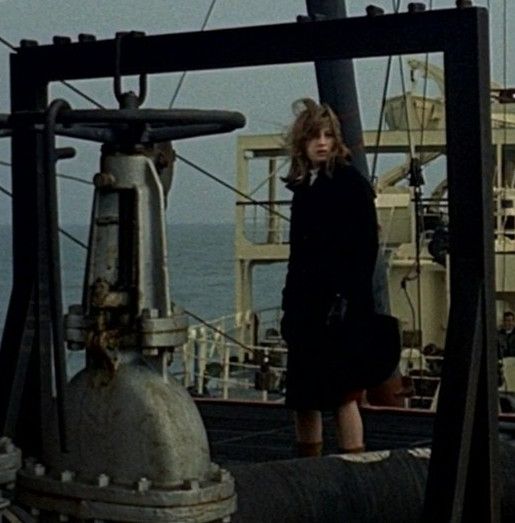 From Antonioni's Red Desert: a cropped section of a shot during the SAROM oil rig sequence, isolating the black metal frame in which Giuliana (Monica Vitti) is caught for a moment.