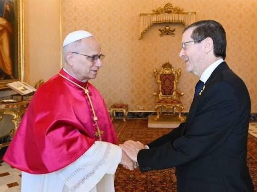 Pope Leo greeting the genocide regime's president, Issac Herzog.