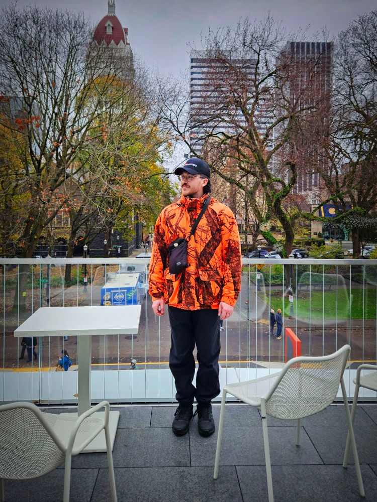 A picture of me with downtown Portland in the background