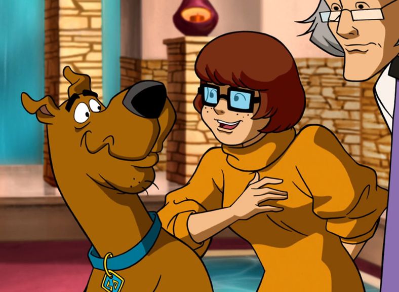 Velma apologizes to Scooby for doubting his plan to wake Shaggy up with the smell of Scooby Snacks (Scooby-Doo! Legend of the Phantosaur, 2011)