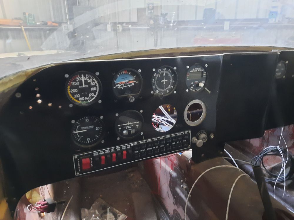 An experimental aircraft instrument panel with steam gauges. 