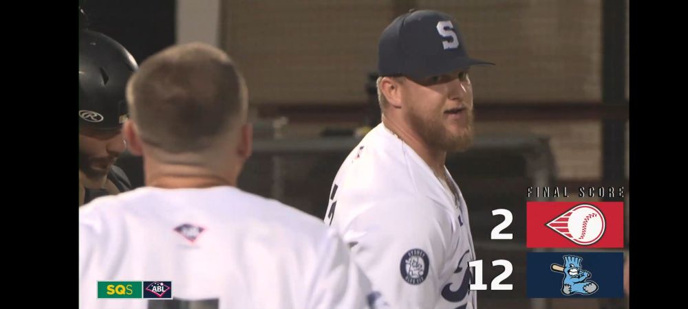 Sydney Blue Sox 12 - Perth Heat 2 final score and two Sydney Blue Sox players .