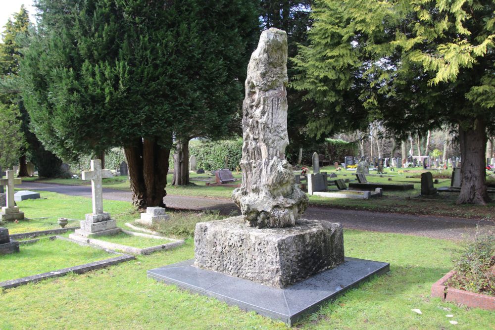 A fossil tree used as a monument on the grave of Alfred Russel Wallace in Poole
