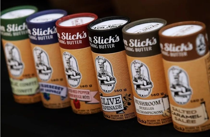 A few of Canadian company's Von Slick's finishing butters using push up tube packaging. 