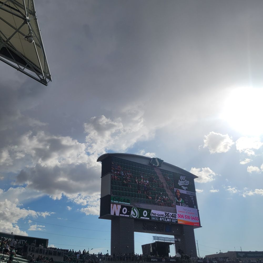 Mosaic field scoreboard as a sprinkle falls