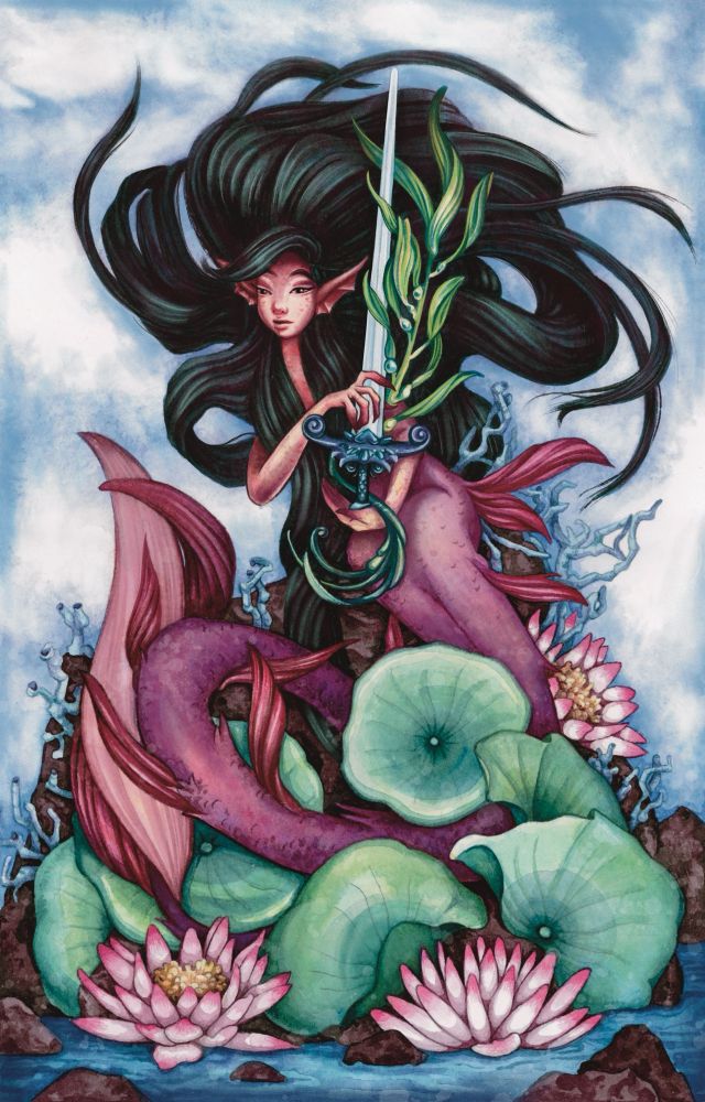 Ace of swords nautical mermaid on rocks in cove with water lilies and coral. Mermaid holding upright sword covered in algae surrounding a blue sky with scattered clouds 