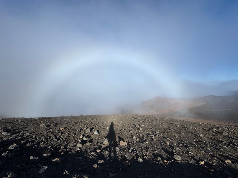 White rainbow and the shadow of a person. 