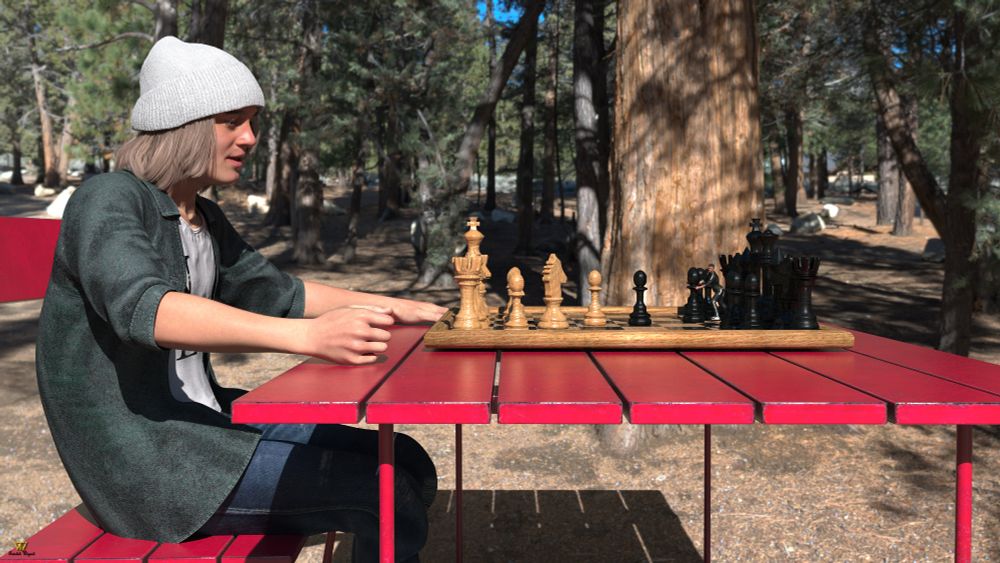 Tiny guy playing chess with is friend in the park. Seems he is having trouble moving the pieces.