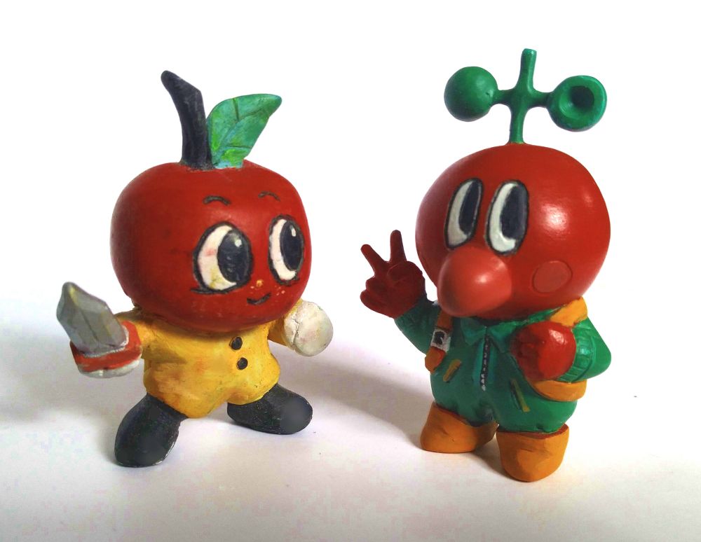 th clay models of Apple Warrior from Apple Quest Monsters and Anemo from Formless Star next to each other