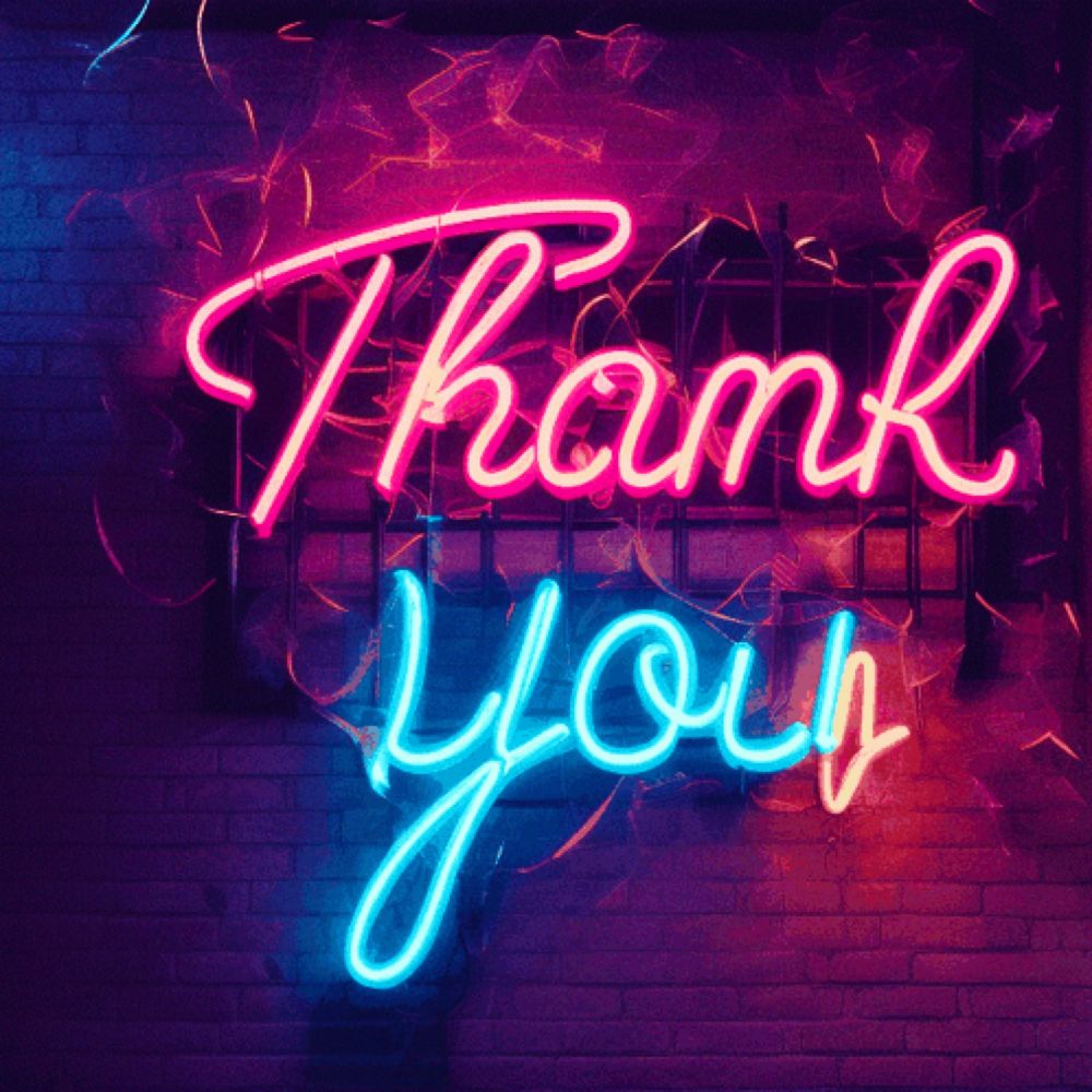 a neon sign that says thank you is lit up