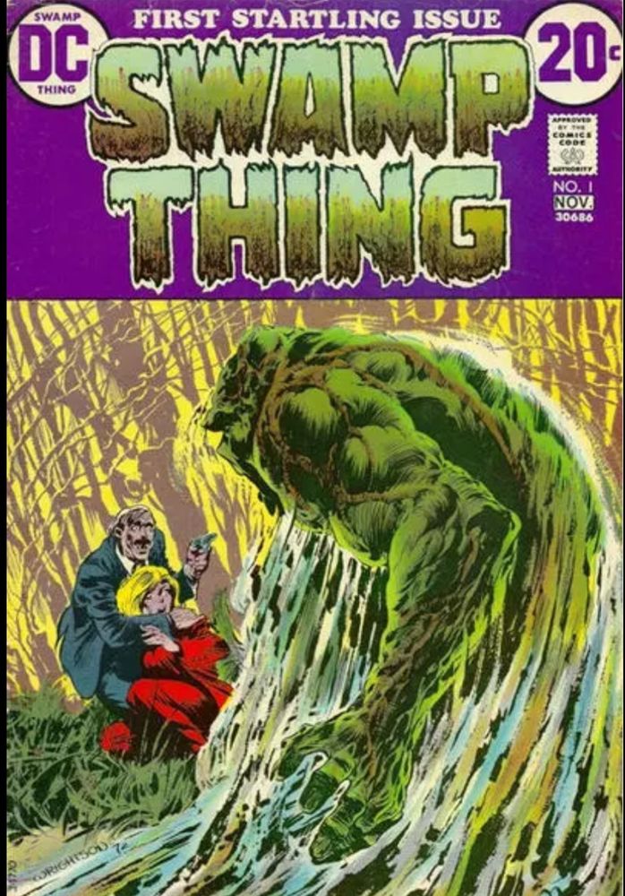 Swamp Thing! First Startling Issue! A November 1972 DC comic with a price of 20¢. the eponymous Swamp Thing emerges from a swamp, looking green and swampy. he faces a man with a gun, holding a woman hostage. will Swamp Thing save the day? probably! but in real life, Swamp Thing is RFK junior, so probably not! stay tuned!