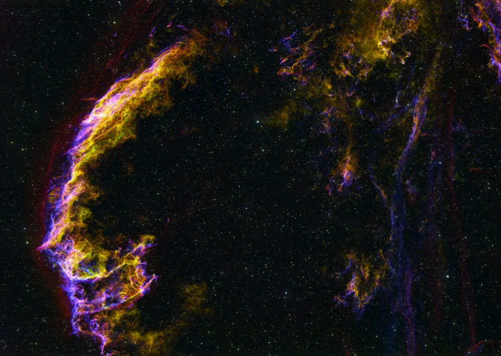 supernova remnant emission nebula. Red is hydrogen, green sulfur, and blue oxygen. They combine to show magenta, yellow and cyan too. Best 62 of 77 240s exposures taken through SHO filters with a Takahashi TSA-120 with 0.7x reducer and ZWO ASI2600MM camera.