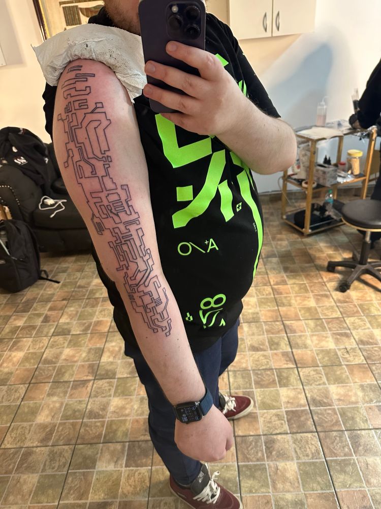 Line work done for the Mirror’s Edge circuit schematic arm tattoo. 