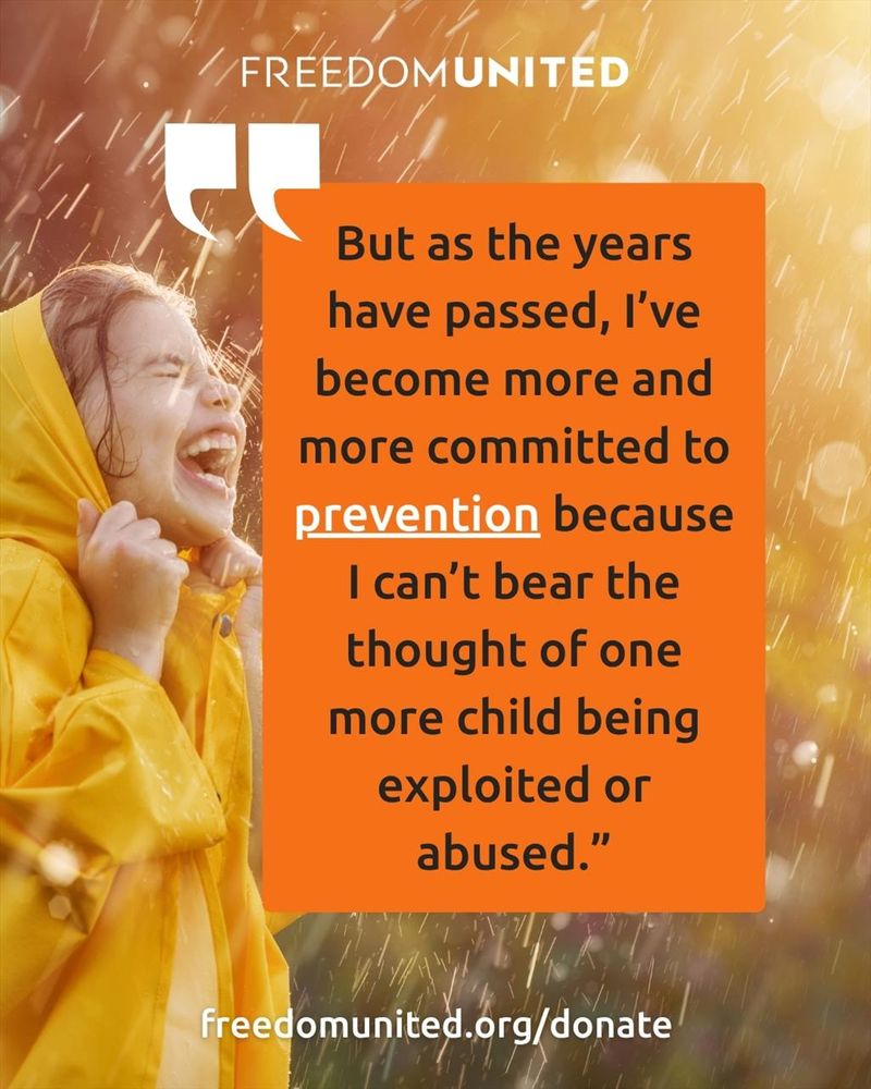 girl laughing in the rain with a yellow raincoat representing a free child