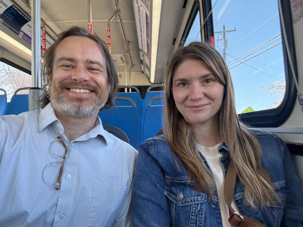 Two humans riding a WeGo bus in Nashville, Tennessee circa 2025. 