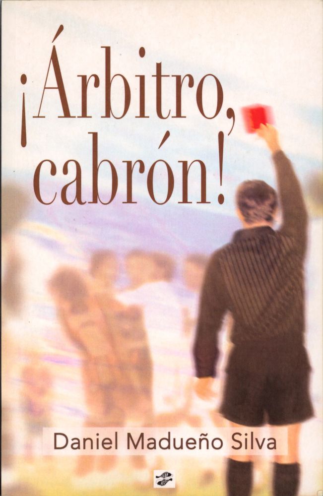Book cover of Spanish novel "Arbitro, cabrón!", a coming-of-age novel by a former top referee, showing the title and an out-of-focus photo of a referee showing a red card to brawling players.