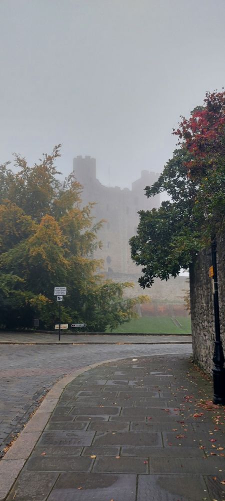 Rochester Castle shrouded in mist on an autumn morning