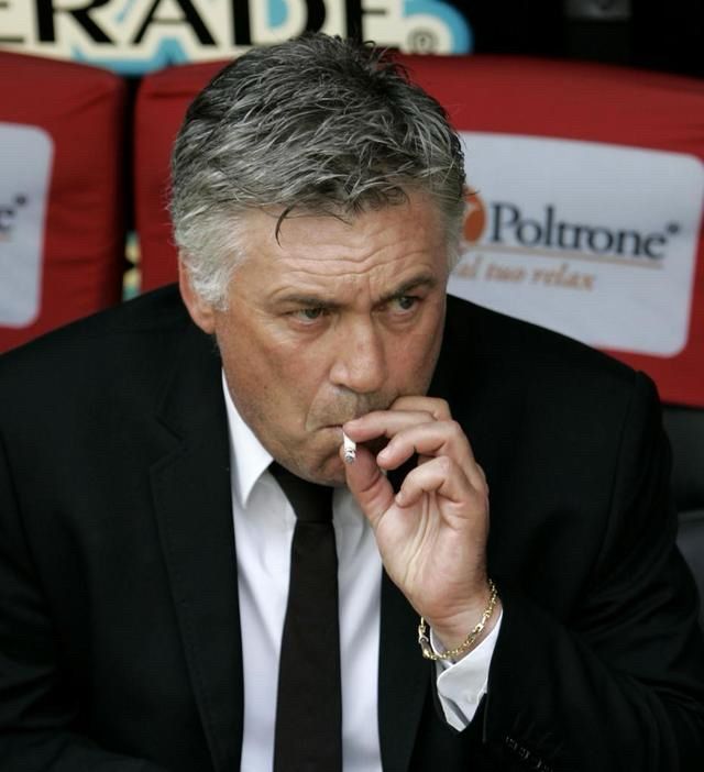 Carlo Ancelotti Smoking a cigarette in a suite on the bench