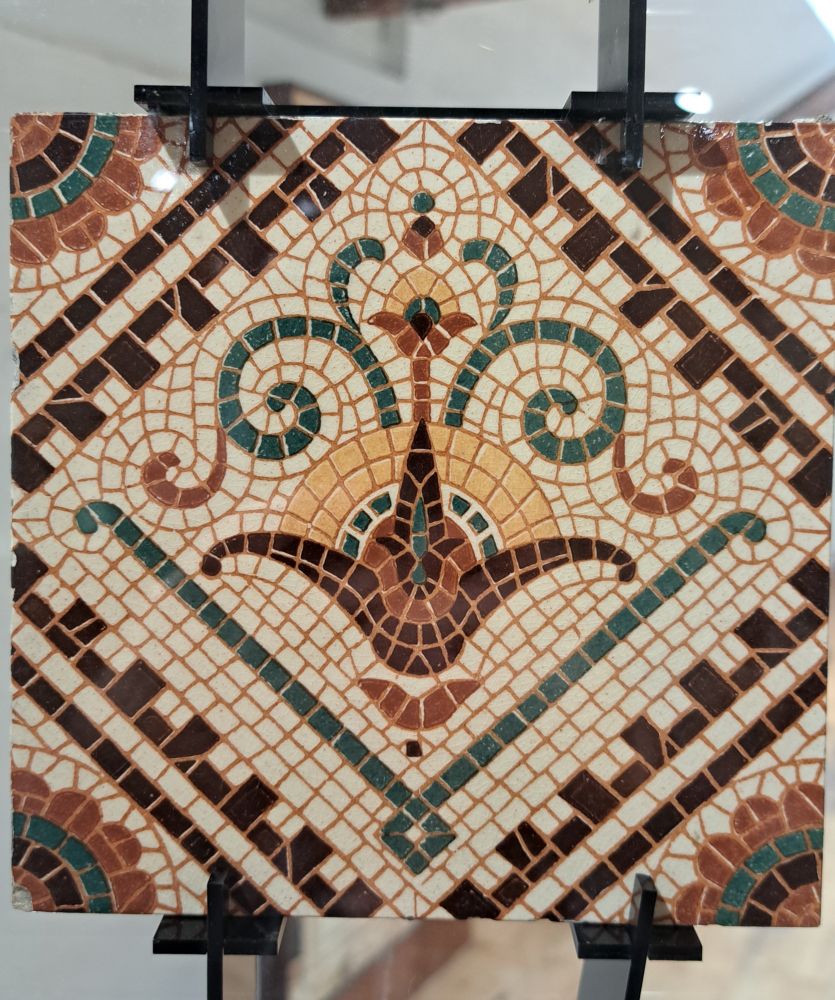 Single Tile painted to look like a mosaic 