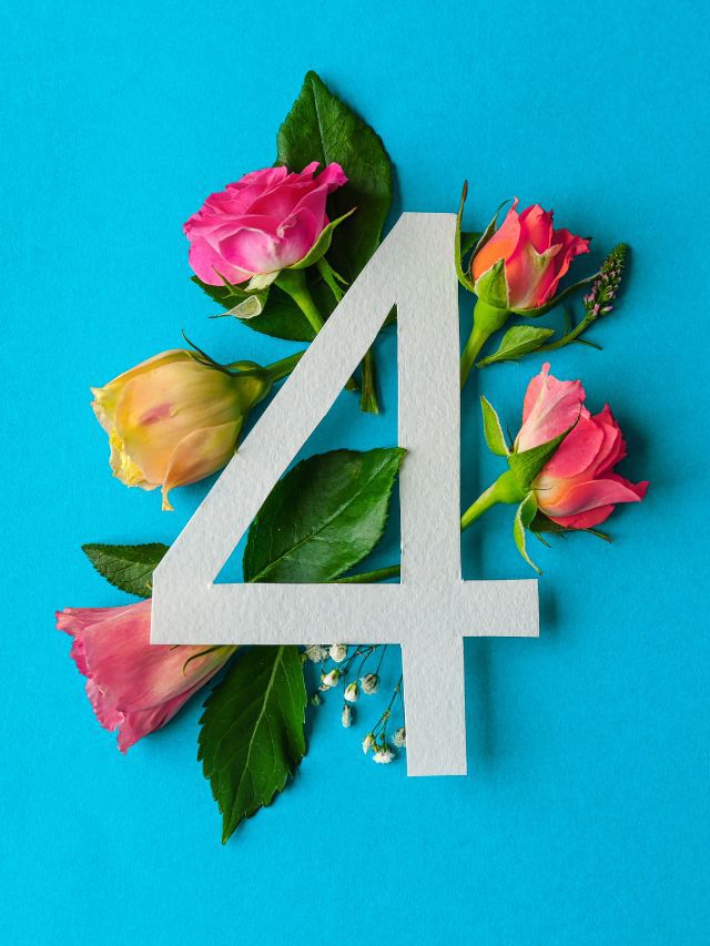 A large white number "4" is placed on a bright blue background, surrounded by various colorful roses and green leaves.