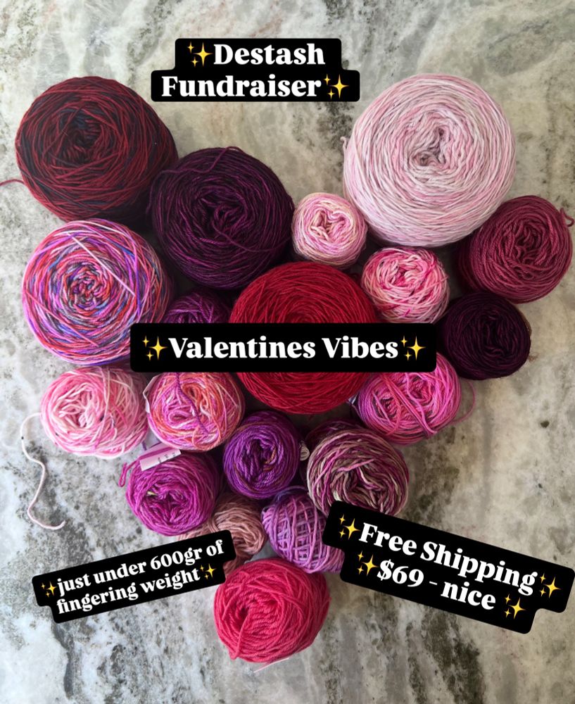 A grey marble background with red and pink yarn cakes arranged in a heart shape.  Overlaid text reading: Destash Fundraiser, Valentines Vibes, just under 600gr of fingering weight, free shipping $69 nice