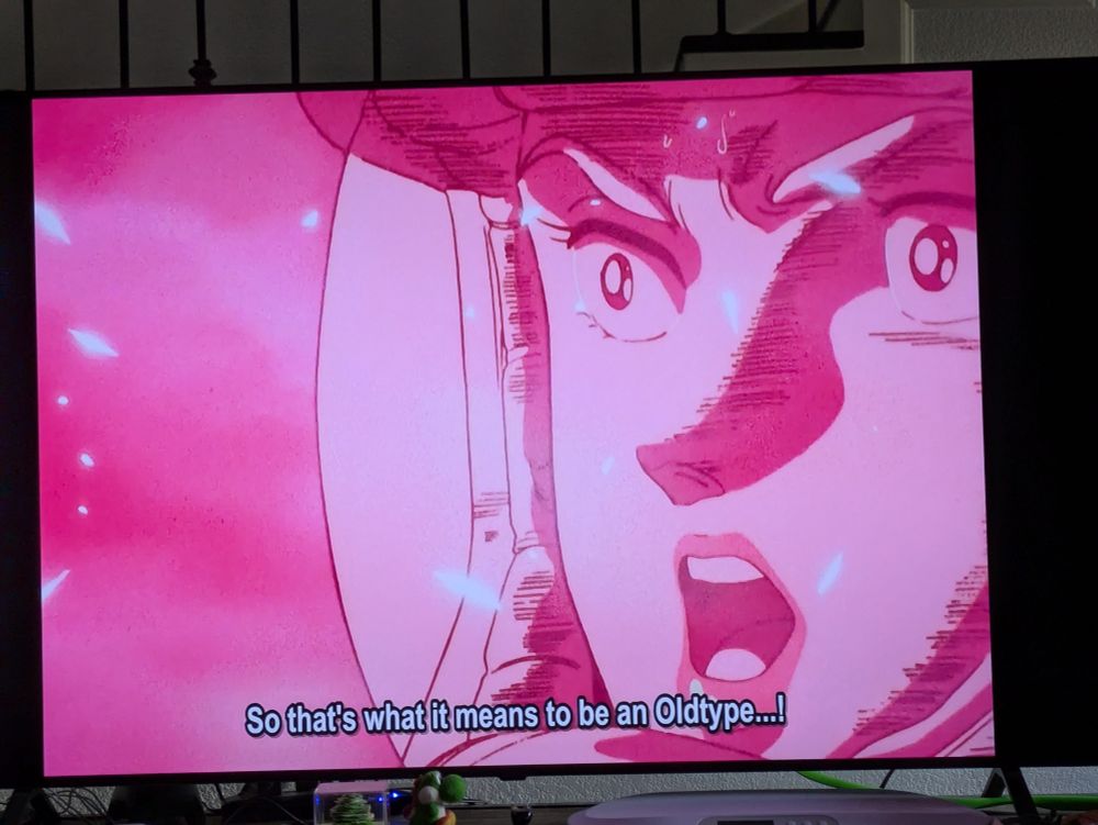 Zeta Gundam, pilot (Lila) bathed in pink light, face awed: so that's what it means to be an Old type...!