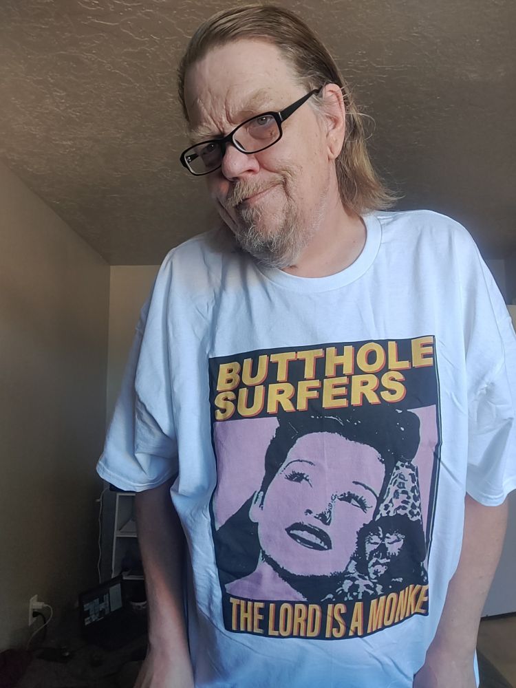 me in a Butthole Surfers tshirt.