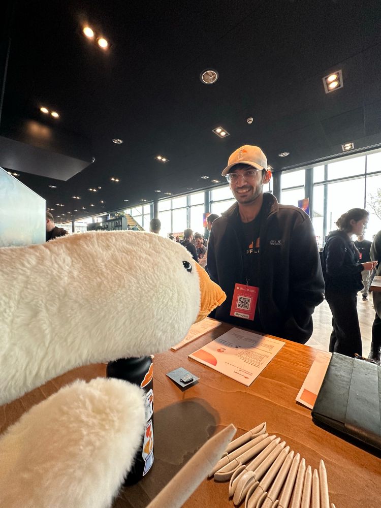 Plush goose at the Cloudflare conference booth